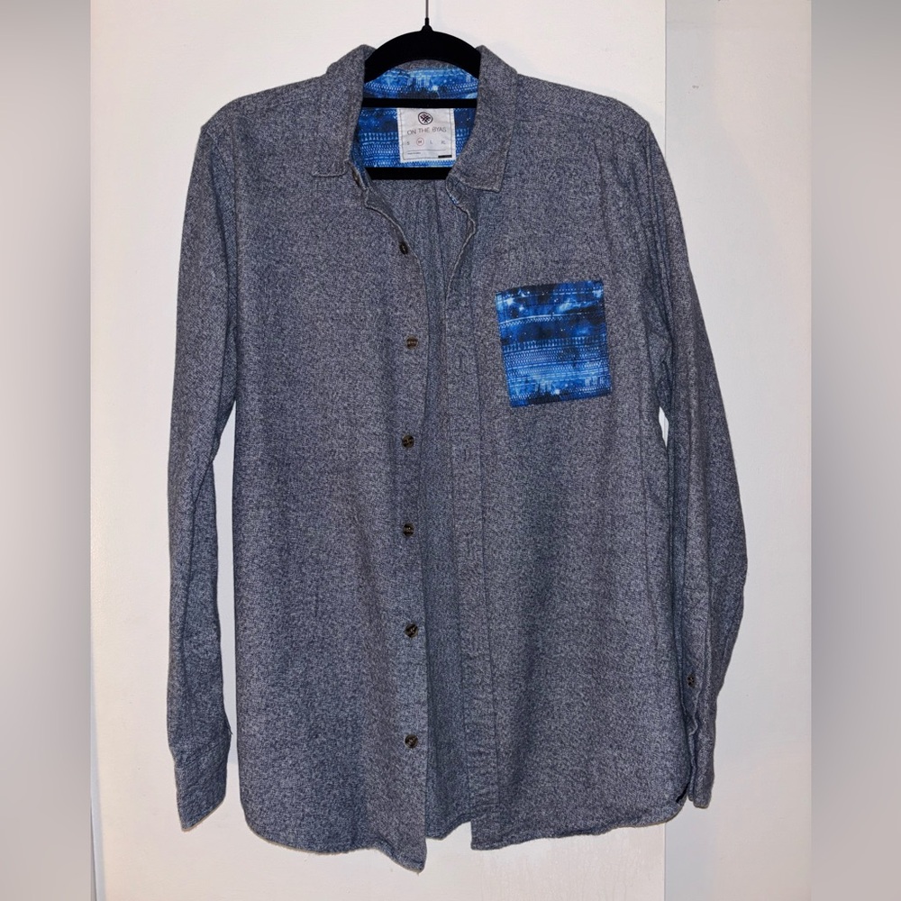 On the Byas Gray Shirt with Blue Accents